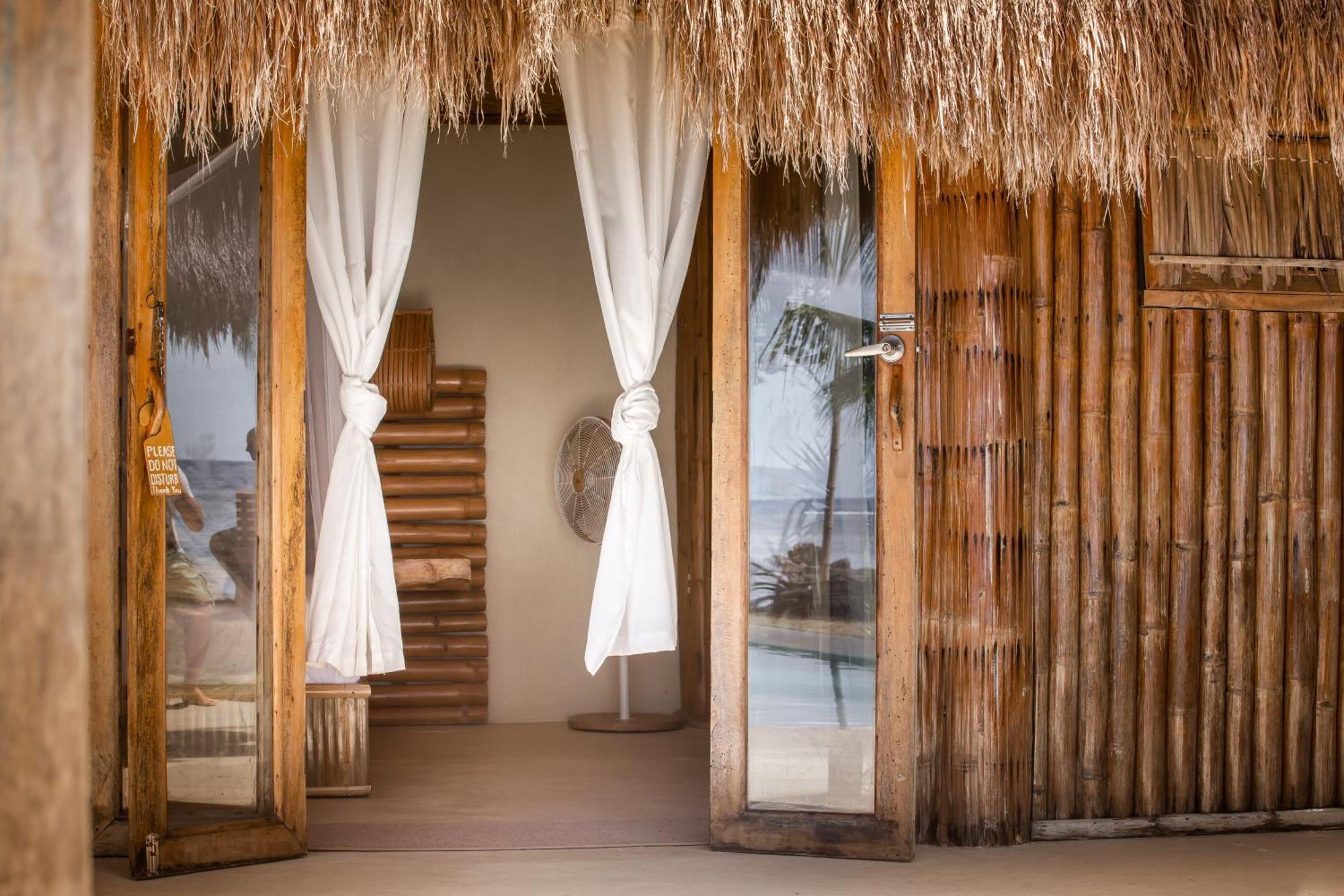 The Beach House Ocam Ocam Бусуанга Экстерьер фото